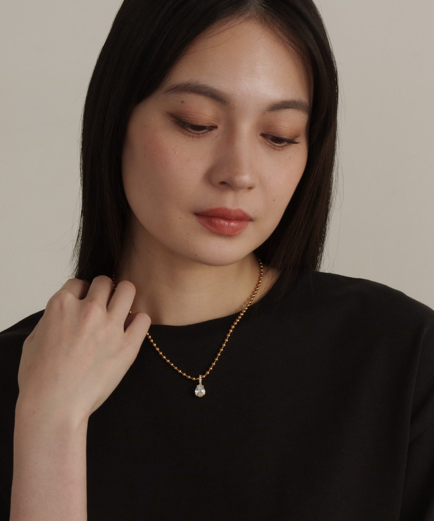 ボールチェーンティアドロップネックレス【Gold×Clear】